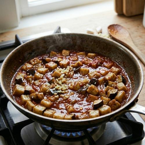 Step 4: Add Garlic and Marinara Sauce