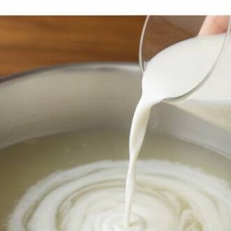 Step 3: Incorporate Broth and Milk